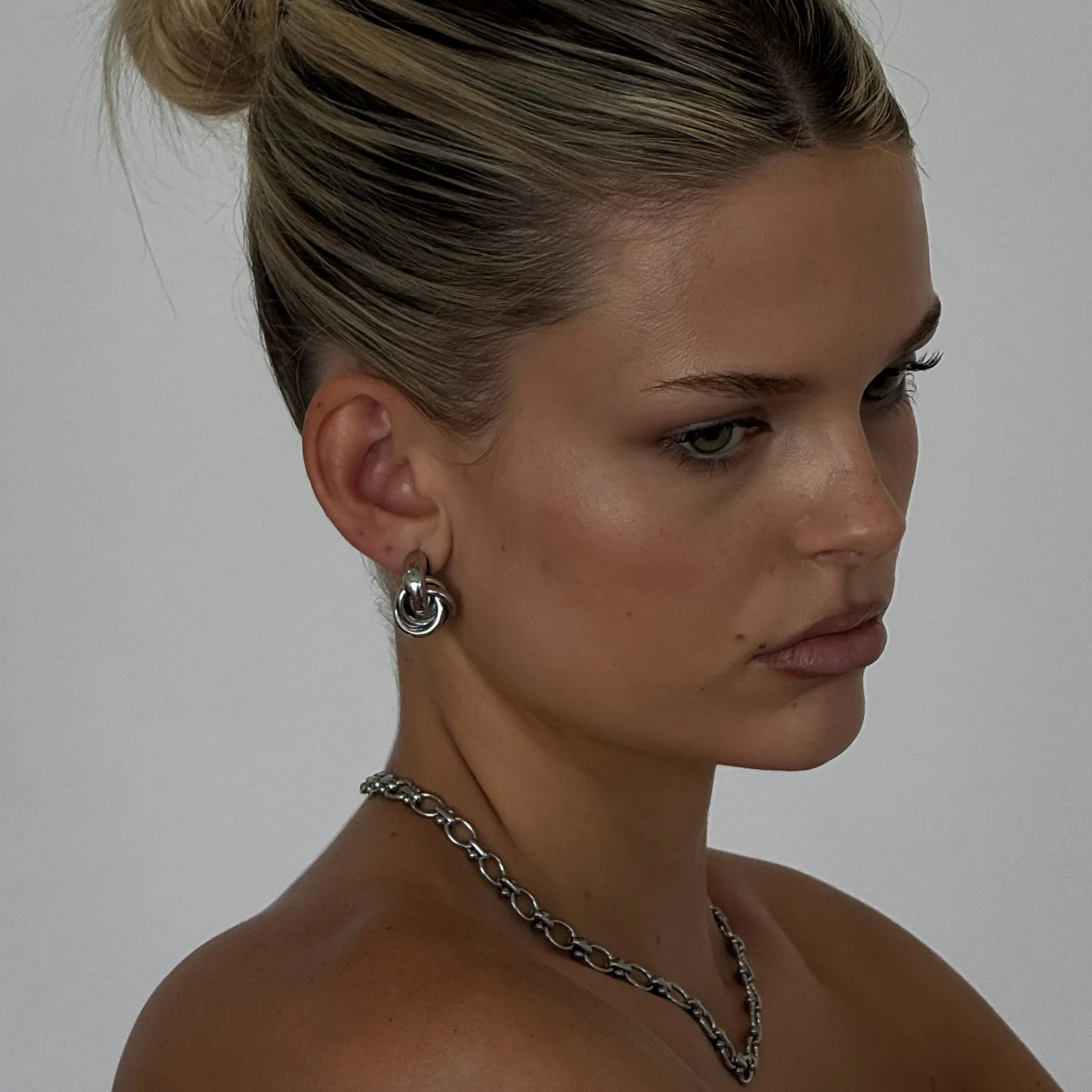 the Kyra Knot Earrings, by Zaya Collective.
